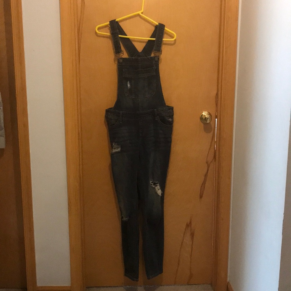 dark wash overalls with rips